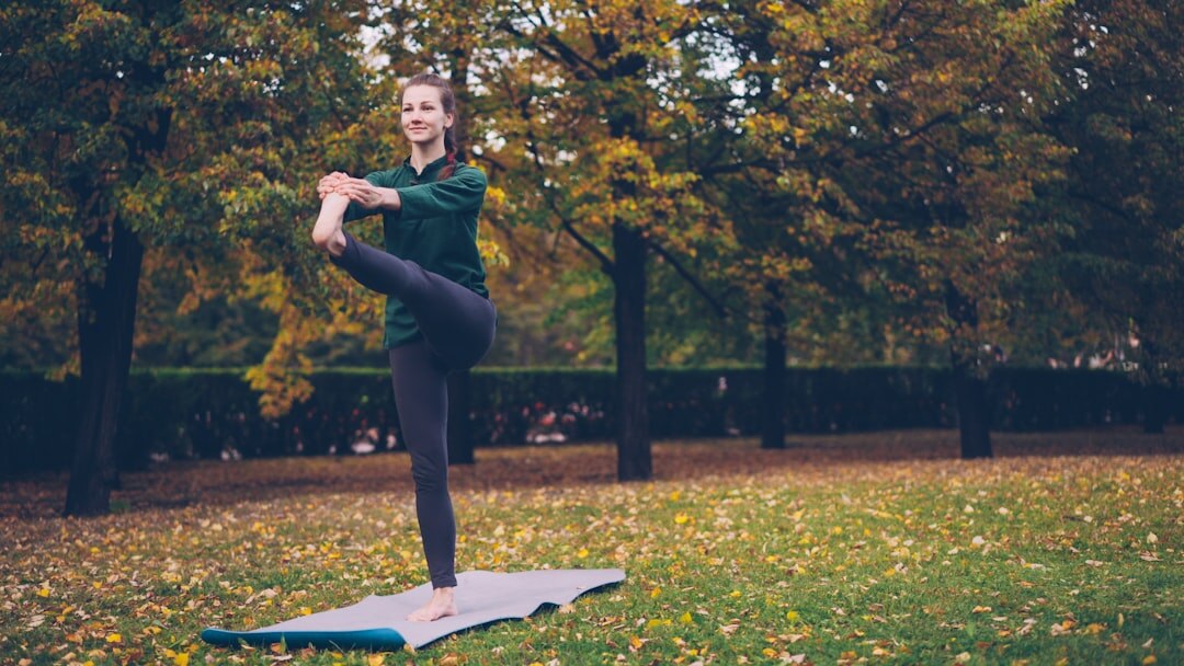 woman doing yoga outdoors