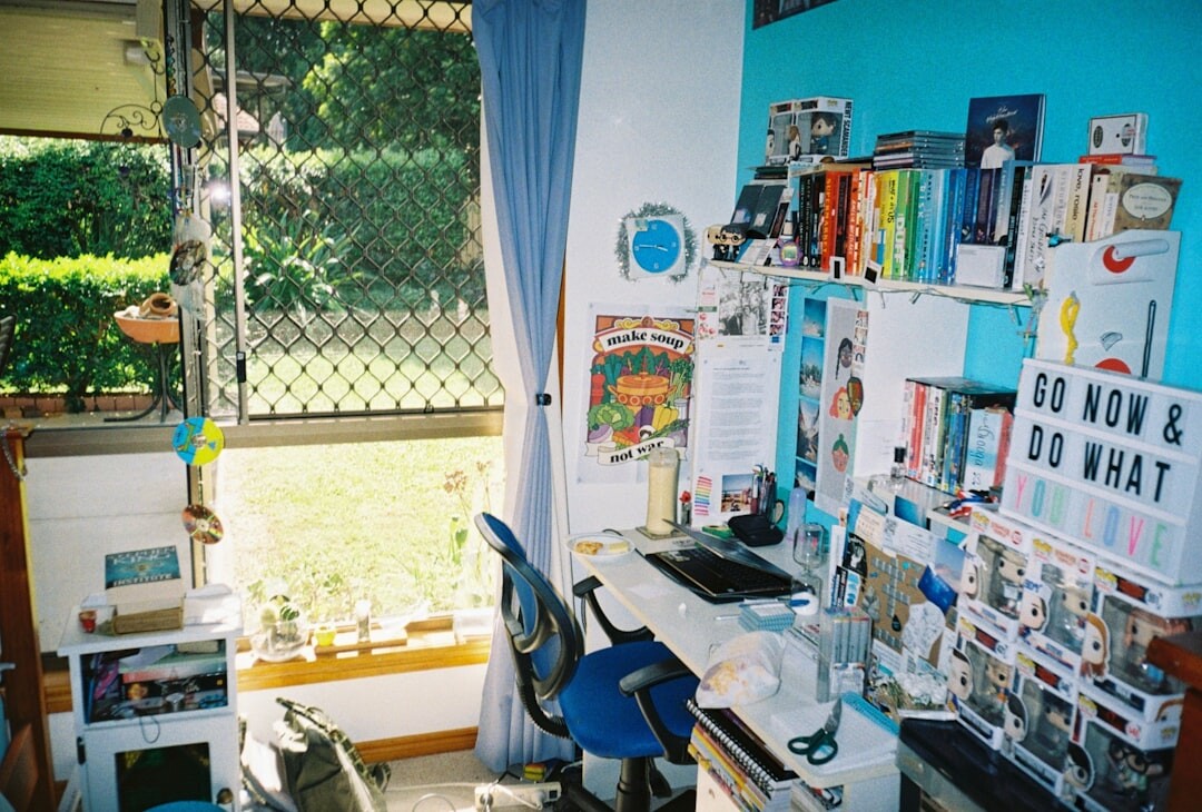 Modern newsroom office with journalists working at desks