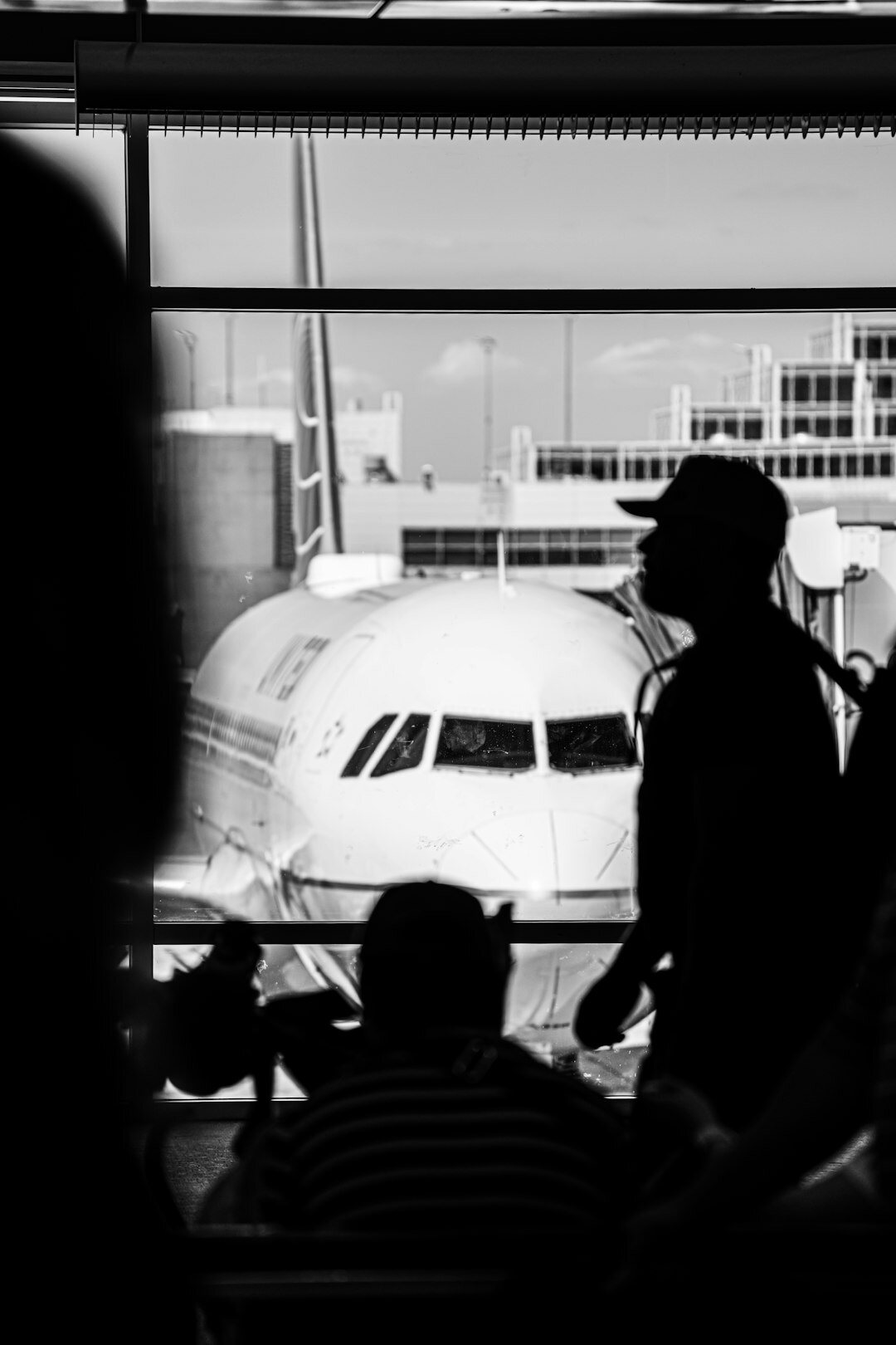 football player arriving at airport
